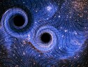 Rappresentazione artistica di due buchi neri (fonte: collaborazione Virgo) (ANSA)