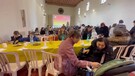 Roma, il pranzo di beneficenza organizzato per i profughi ucraini a Trastevere (ANSA)