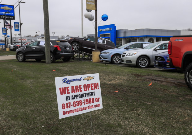 Auto dealer remains open by appointment only © EPA