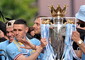 Manchester City team celebrate Premier League title © Ansa