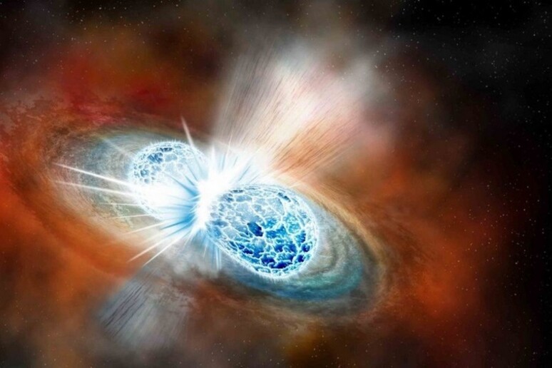 Rappresentazione artistica delle onde gravitazionali generate dalla collisione di due stelle di neutroni (fonte: Robin Dienel/The Carnegie Institution for Science) - RIPRODUZIONE RISERVATA