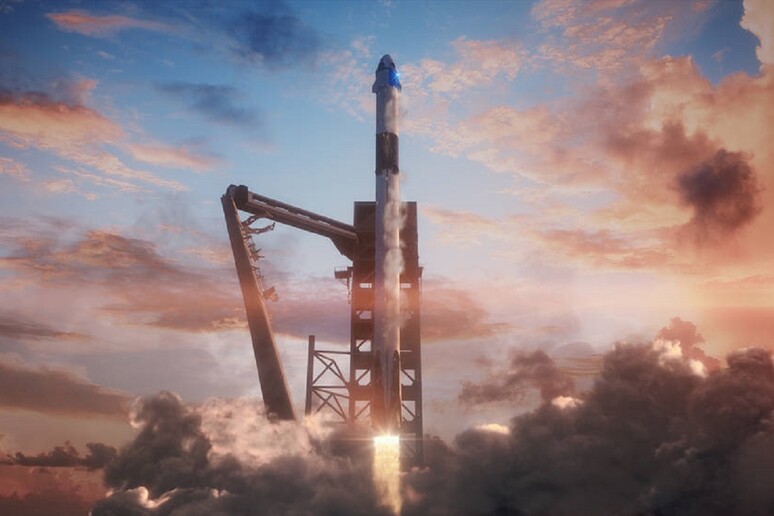 Rappresentazione artistica del lancio della capsula Crew Dragon della Space X con un razzo Falcon 9 (fonte: NASA) - RIPRODUZIONE RISERVATA