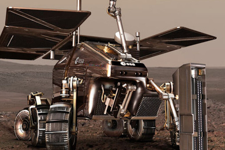 Rappresentazione artistica del rover della missione ExoMars 2020; sulla destra la trivella realizzata in Italia (fonte: European Space Agency/AOES Medialab artist 's concept) - RIPRODUZIONE RISERVATA