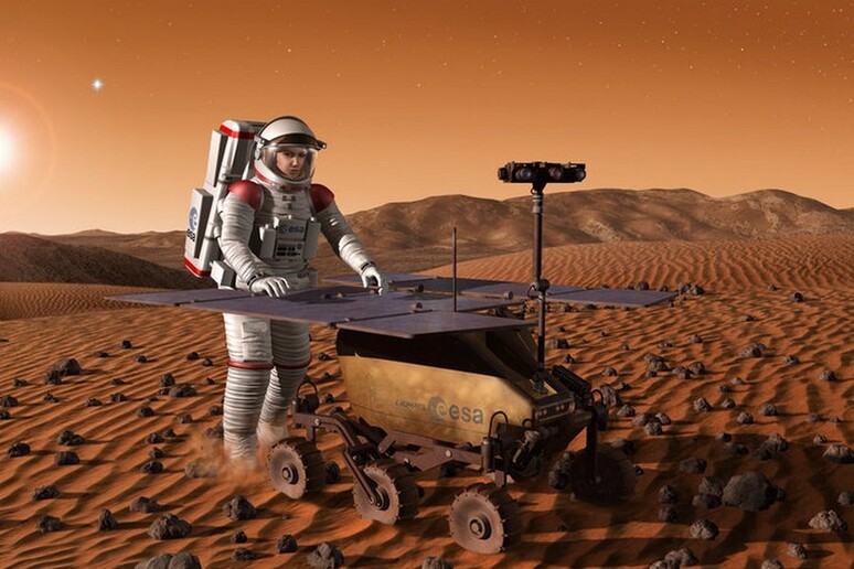 Rappresentazione artistica di un asteronauta su Marte (fonte: ESA) - RIPRODUZIONE RISERVATA
