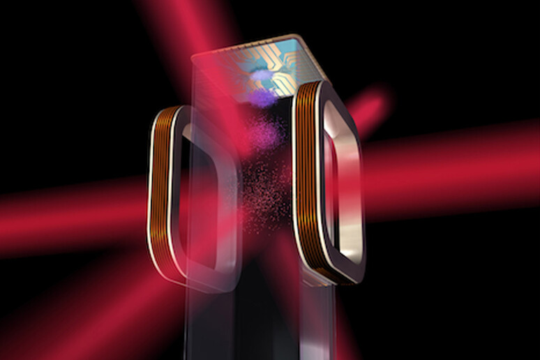 Rappresentazione artistica del chip che utilizza dei laser per raggiungere temperature ultrafredde, installato dalla Nasa sulla Stazione Spaziale (fonte: NASA) - RIPRODUZIONE RISERVATA