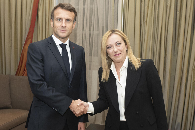 Giorgia Meloni e Emmanuel Macron - RIPRODUZIONE RISERVATA