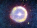 Un campo di stelle di prima generazione come sarebbero apparse 100 milioni di anni dopo il Big Bang (fonte: NOIRLab/NSF/AURA/J. da Silva/Spaceengine) (ANSA)