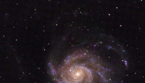 Le linee bianche indicano la supernova SN 2023ixf, ai margini della galassia Messier 101 (fonte: Florian Rünger, da Wikipedia) (ANSA)