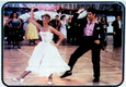 John Travolta e Olivia Newton John sulla locandina di Grease (ANSA)