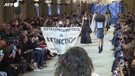 Parigi, blitz degli attivisti del clima alla sfilata di Louis Vuitton (ANSA)