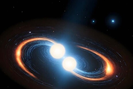 Rappresentazione artistica di due stelle di neutroni vicine alla collisione che le trasformerà in  kilonova (fonte: Clara &amp; Sofía López Martín/Freepik, Alberto J. Castro-Tirado/IAA-CSIC/UMA)