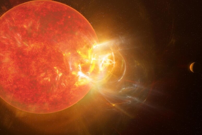 Rappresentazione artistica di un’eruzione stellare su Proxima Centauri, a 4,2 anni luce dal Sole (fonte: NRAO/S. Dagnello) - RIPRODUZIONE RISERVATA